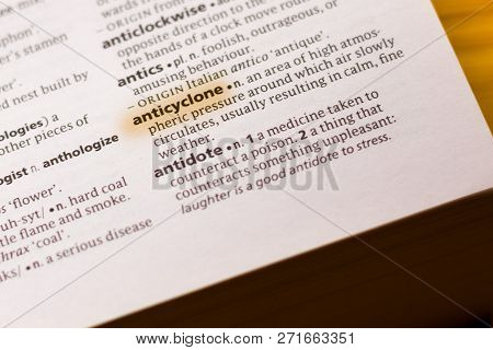 The Word Or Phrase Anticyclone In A Dictionary Highlighted With Marker.