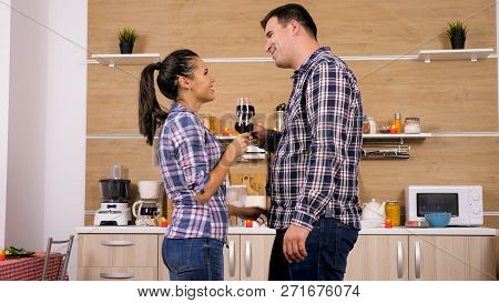 Young Happy Couple Enjoy Some Great Red Wine