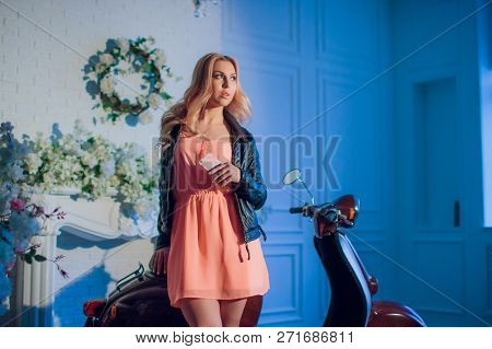 Sexy Biker Lady In Black Leather Jacket Sit On Vintage Custom Caferacer Motorbike And Touch Her Hair