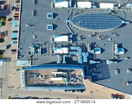 Koszalin, Poland - 13 September 2018 - Aerial view on Shopping Center Emka roof in north district of Koszalin city, Wladyslawa IV street area