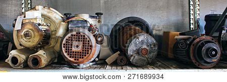 Broken Motors And Parts In A Junk Yard