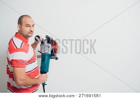 Construction Worker With A Puncher Scream On A White Background.