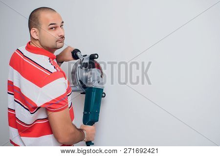 Construction Worker With A Puncher Scream On A White Background.