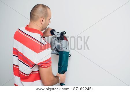 Construction Worker With A Puncher Scream On A White Background.