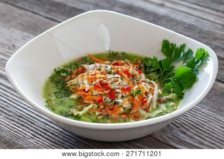 Vegetarian Dish. Vegan Green Cabbage Soup Made From Chinese Cabbage, Carrots, Peppers, Tomatoes, Avo