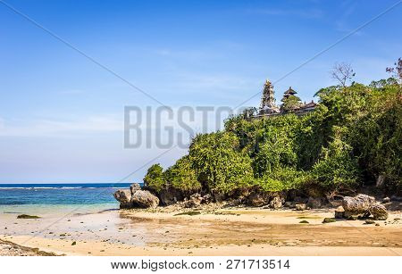 Traditional Pura Temple On A Cliff At Geger Beach On Bali Island, Indonesia