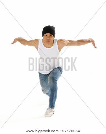 Urban style street breakdancing handstand grab move done isolated on white in studio