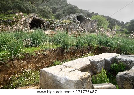 Ruined Walls Of Castle Over The Lake Bafa In A Nature Reserve Situated In Southwestern Turkey