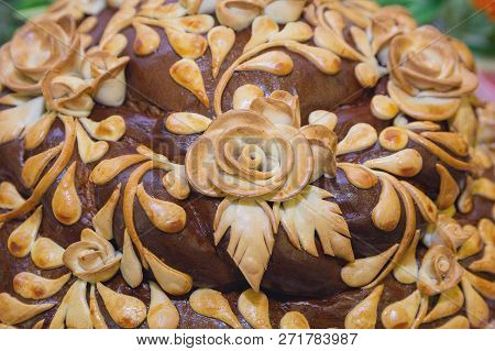 Fresh Loaf With Decoration In The Form Of Flowers Closeup. Food