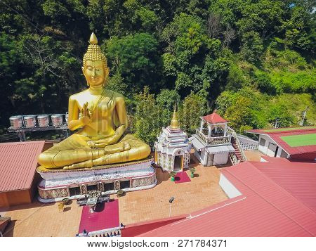 Golden Statue Sitting Buddha, Wat Khao Rang Samakkhitham, Phuket, Thailand