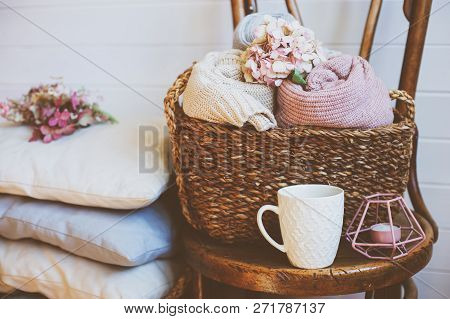 Cozy Still Life Interior Details. Organizing Clothes In Wicker Backets, Seasonal Wardrobe Cleaning, 