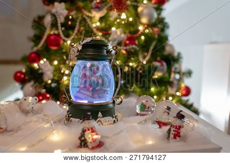Christmas Decoration, Snow Dome, Globe With Table Decoration, Santaclaus On Sleigh With Child In Win