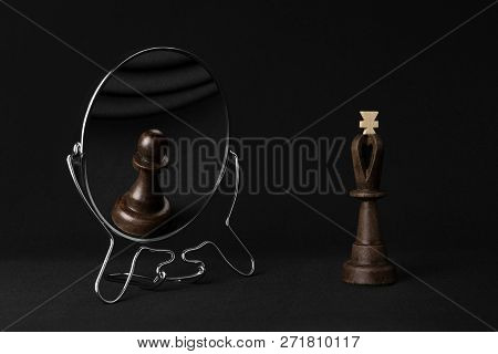 Black King Sees A Black Pawn In The Mirror