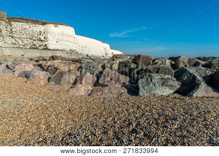 Saltdean Beach Seafront And White Sandstone Chalk Cliffs With Walkway For People Exercise. Underclif