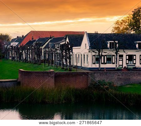 View On Some Modern Houses With Water And Grass At Sunset In The City Leerdam The Netherlands, Typic