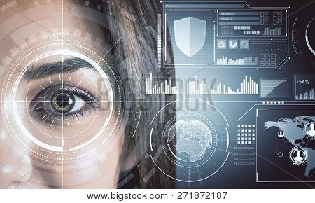 Close Up Of Woman Face With Digital Business Interface. Biometrics And Future Concept. Double Exposu