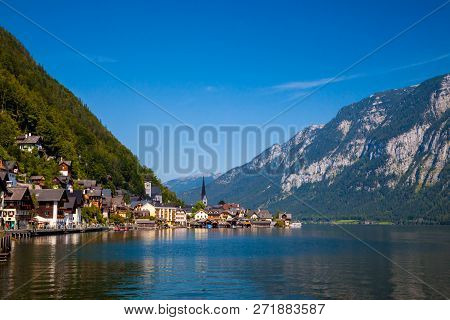 Lookin Across The Lake At The Idyllic Village Of Hallstatt, Austria