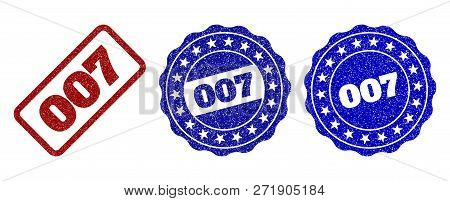 007 Grunge Stamp Seals In Red And Blue Colors. Vector 007 Labels With Draft Texture. Graphic Element