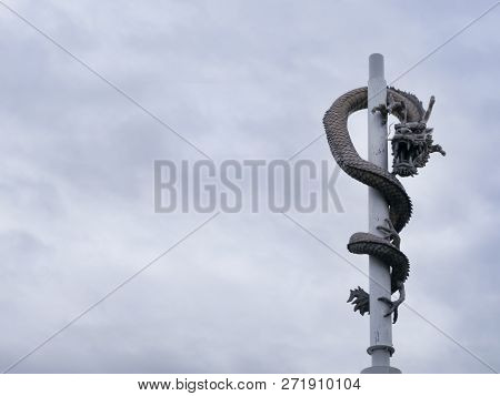 Stone Deagon On The Pillar. Sokcho City, South Korea