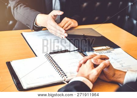 Successful Business Senior Manager During A Job Interview With Employee Young Man Meeting Applicant