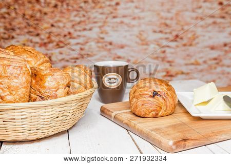 An Buttercake With Raisins And Croissant Is Made Of Puff Pastry
