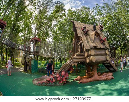 Moscow, Russia - July 26, 2018: Unidentified People Look At  Fairytale Hut On Chicken Legs In Childr