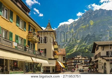 Grindelwald, Switzerland - July, 2013: Dorfstrasse Street In Grindelwald With Parts Of Mattenberg In