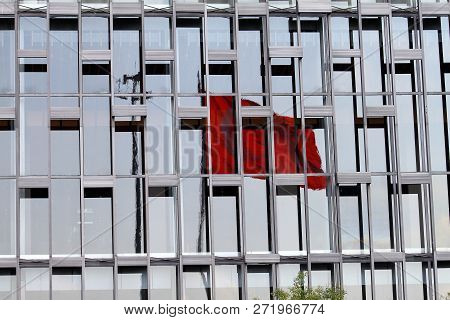 Reflection Of The Turkish Flag On  Building In Modern Glass Facade