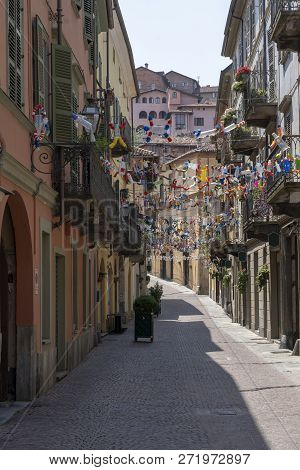 Saluzzo, Cuneo, Piedmont, Italy: Historic Buildings Along An Old Typical Street