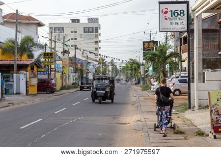 Negombo, Sri Lanka - July 22, 2018: People On The Main Road In The Tourist Area North Of The Ciry Ce