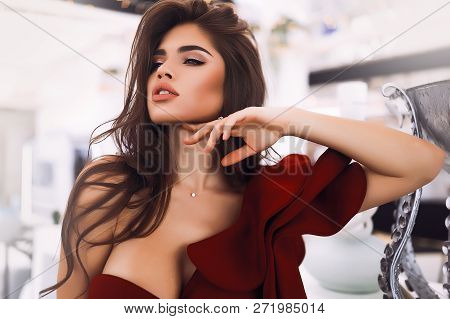 Fancy Beautiful Model With Evening Makeup, Stylish Long Hair And Accessories. Hand Near The Face. Re