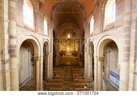 Leon, Spain - June 27, 2017: Parishioners praying in the basilica of san Isidoro.