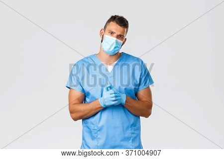 Healthcare Workers, Covid-19, Coronavirus And Preventing Virus Concept. Handsome Tired Doctor, Male 