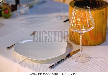 Elegant Restaurant Table Setting Service For Reception With Reserved Card.