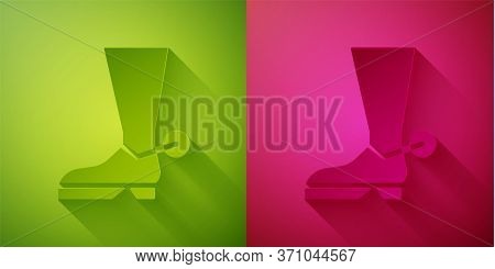 Paper Cut Cowboy Boot Icon Isolated On Green And Pink Background. Paper Art Style. Vector