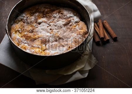 Homemade Apple Pie On A Wooden Table In The Kitchen