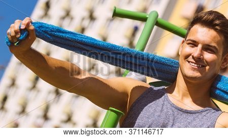 Happy Man Relaxing After Outdoor Workout