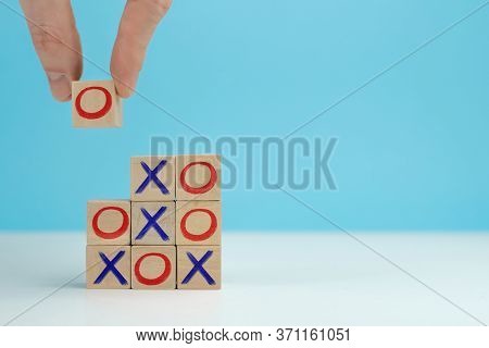 Business Marketing Strategy Planning Concept. Wooden Block Tic Tac Toe Board Game