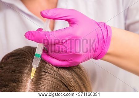 Close Up Of Doctor Cosmetologist Making Mesotherapy Injections In Head Of Woman. Concept Of Mesother