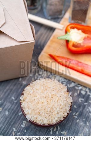 Asian White Rice In Paper Box. Cooking Rice Fast Food.