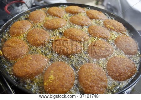 Salvador, Bahia / Brazil - May 9, 2016: Acaraje Fried In Palm Oil In The City Of Salvador. Typical D