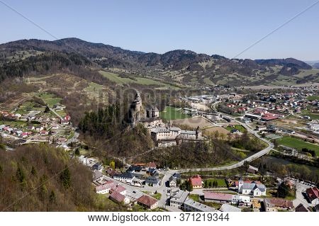 Beautiful View From The Top Of The Town In A Mountain Valley. You Can See The Roads, The River And T