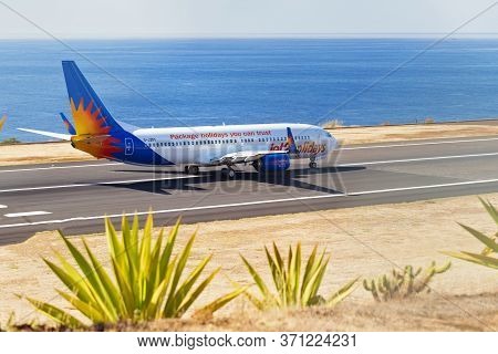 Madeira, Portugal - August 3, 2018: The Plane On The Runway Of Madeira Airport.