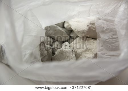 Slices Of Edible Chalk And Clay In A Plastic Bag, Sorbents