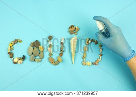 Inscription Corona Virus From Sea Pebbles, A Symbol Of Summer 2020, The Concept Of A Summer Holiday 