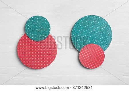 Red And Green Circles On White Wooden Background, Flat Lay. Pareto Principle Concept