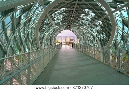 Kuala Lumpur, Malaysia - June 11, 2020: Saloma Link Pedestrian Bridge Connecting Kampung Baru And Kl
