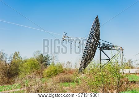 A Large Radio Antenna In The Form Of A Dish Stands In The Field. Astronomical Observatory Of The Aca