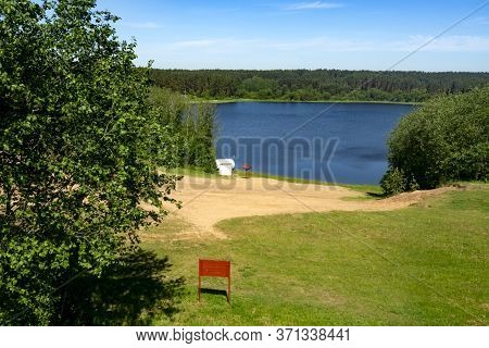 Lake Meadow Surrounded By Forest Near The Town Of Gorodok, Belarus