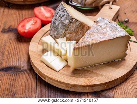 Cheese Tomme De Montagne Or Tomme De Savoie Made From Cow Milk In French Alps.
